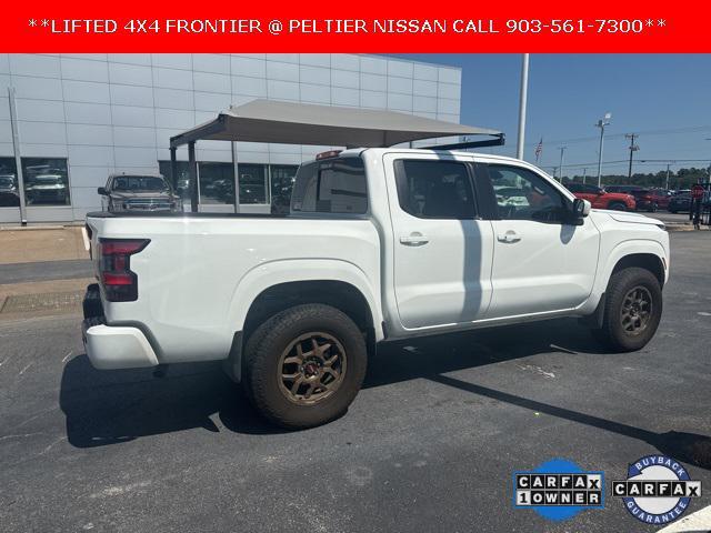 Photo of 2025 Glacier White Nissan Frontier