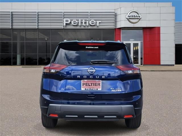 Photo of 2025 Deep Ocean Blue Pearl/Super Black Nissan Rogue