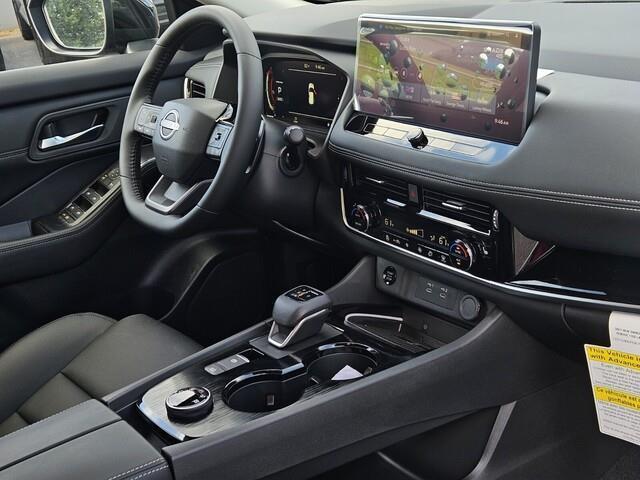 Photo of 2025 Deep Ocean Blue Pearl/Super Black Nissan Rogue