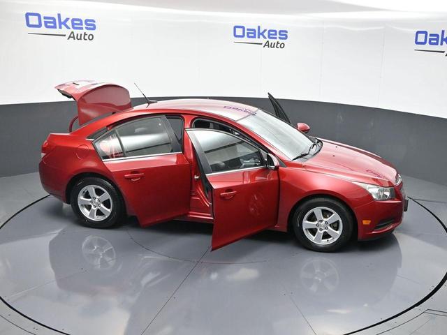 Photo of 2014 Crystal Red Tintcoat Chevrolet Cruze