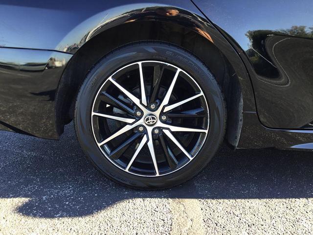 Photo of 2023 Midnight Black Metallic Toyota Camry