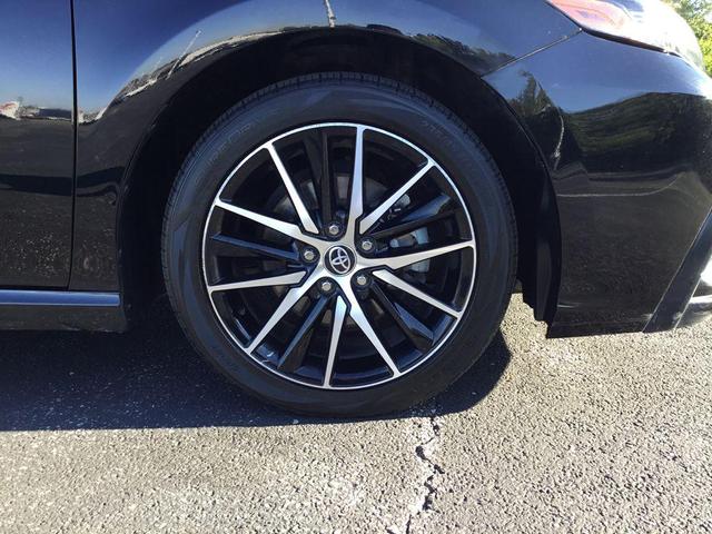 Photo of 2023 Midnight Black Metallic Toyota Camry
