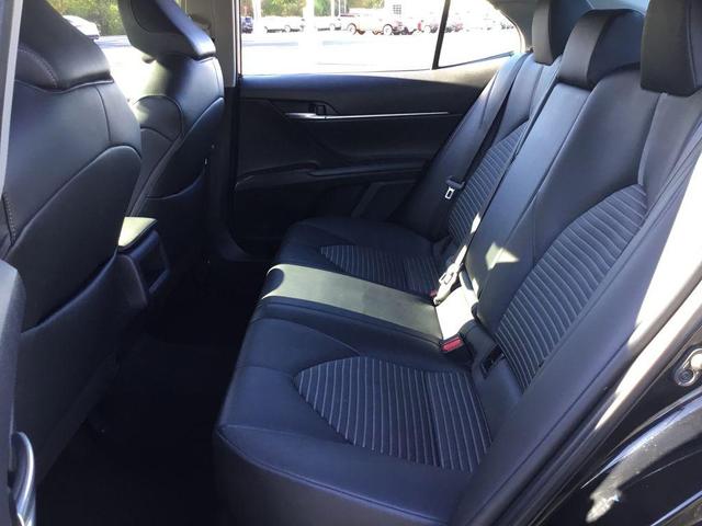 Photo of 2023 Midnight Black Metallic Toyota Camry