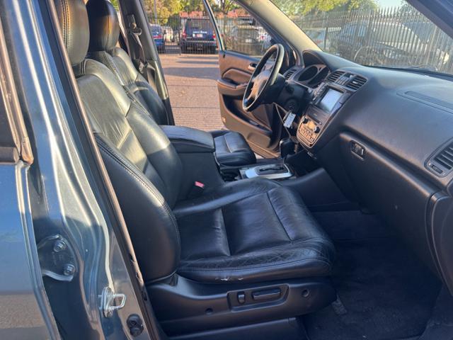 Photo of 2006 Lt. Blue Acura MDX