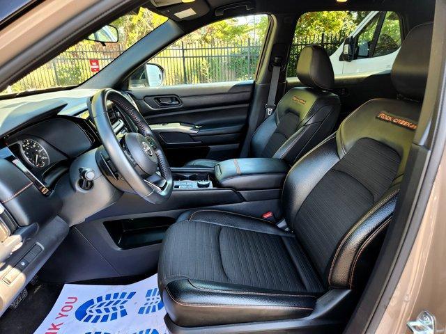 Photo of 2023 2 Tone Tan / Black Roof Nissan Pathfinder