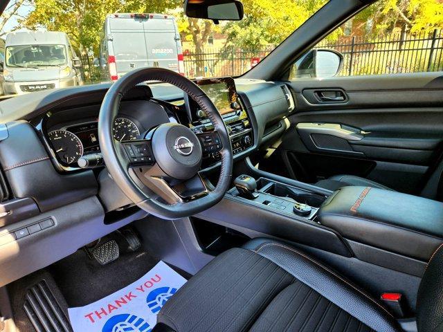 Photo of 2023 2 Tone Tan / Black Roof Nissan Pathfinder