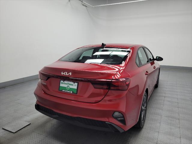 Photo of 2023 Currant Red Kia Forte