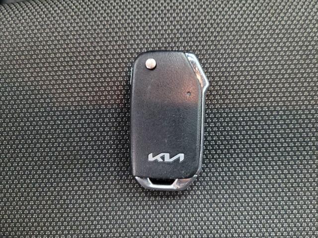 Photo of 2023 Currant Red Kia Forte