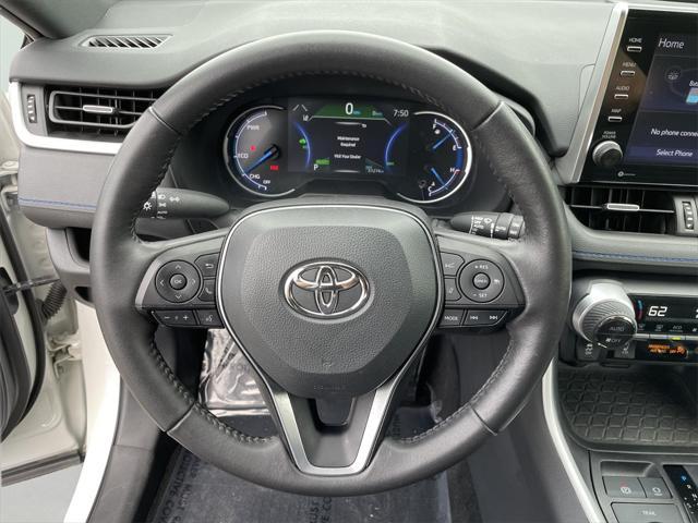Photo of 2022 White Toyota RAV4 Hybrid