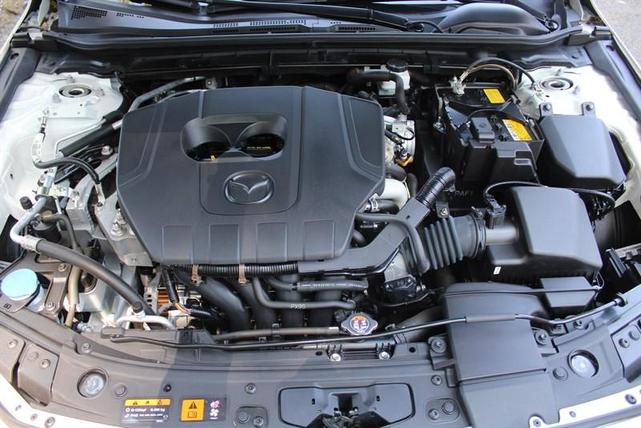 Photo of 2023 Snowflake White Pearl Mazda Mazda3