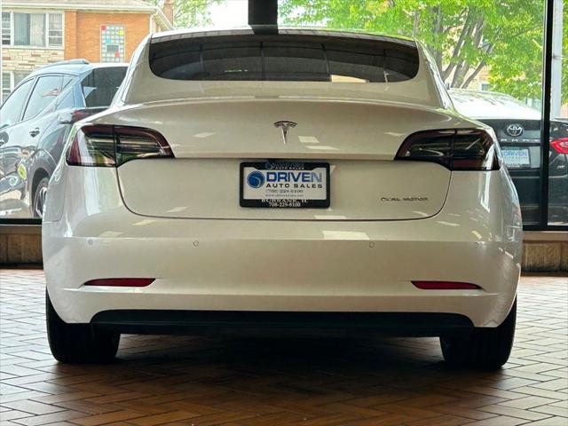 Photo of 2020 Pearl White Multi-Coat Tesla Model 3