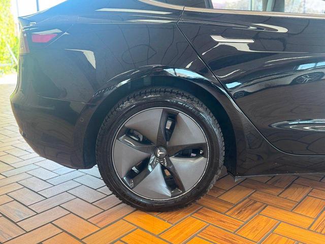 Photo of 2018 Black Tesla Model 3