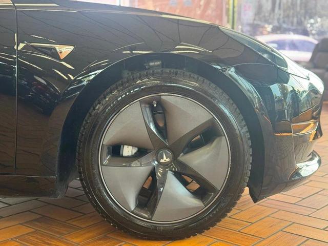 Photo of 2018 Black Tesla Model 3
