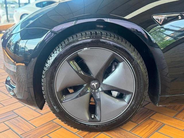 Photo of 2018 Black Tesla Model 3