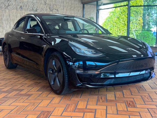 Photo of 2018 Black Tesla Model 3