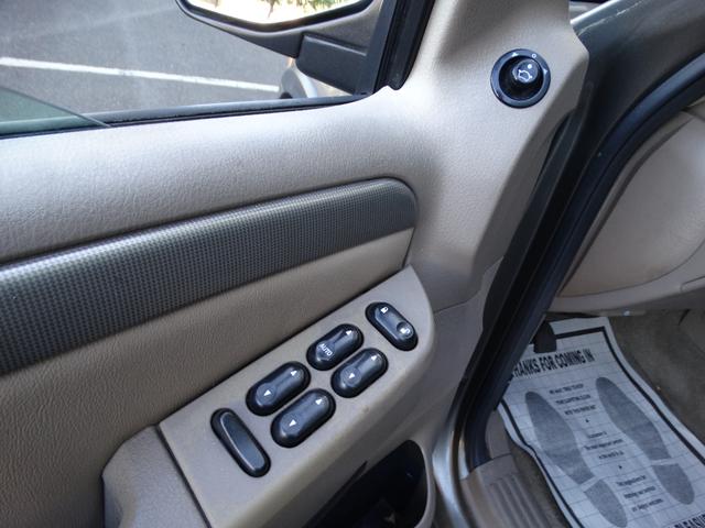 Photo of 2003 gray Ford Explorer