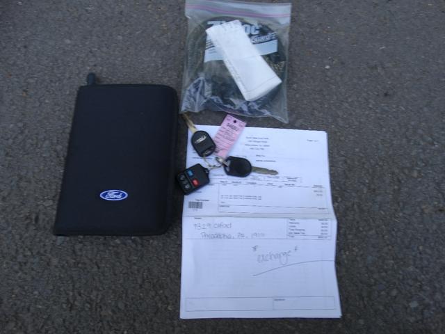 Photo of 2003 gray Ford Explorer