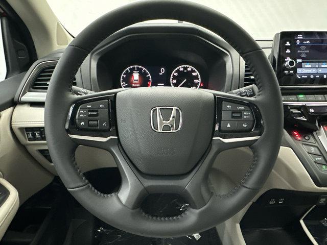 Photo of 2025 Radiant Red Metallic II Honda Odyssey