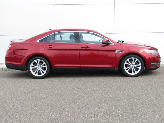 Photo of 2013 Ruby Red Ford Taurus