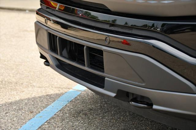 Photo of 2024 Black Metallic Ford F-150 Lightning
