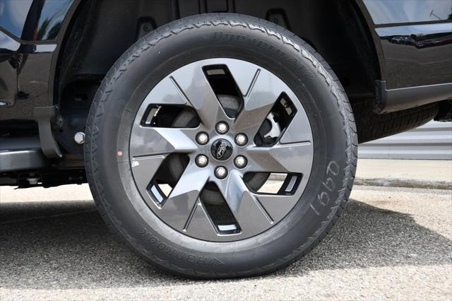 Photo of 2024 Black Metallic Ford F-150 Lightning