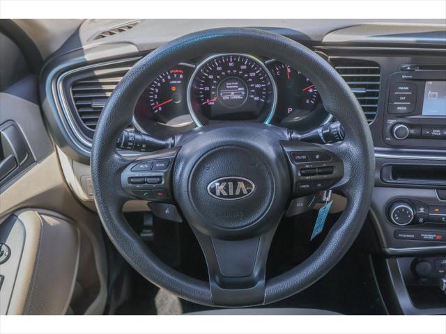 Photo of 2014 Dark Cherry Kia Optima