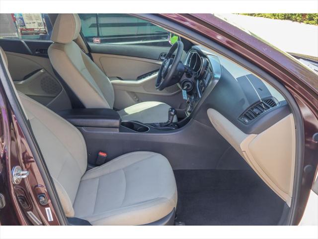 Photo of 2014 Dark Cherry Kia Optima
