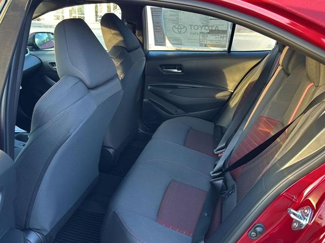 Photo of 2026 Ruby Flare Pearl w/Midnight Black Metallic Roof Toyota Corolla
