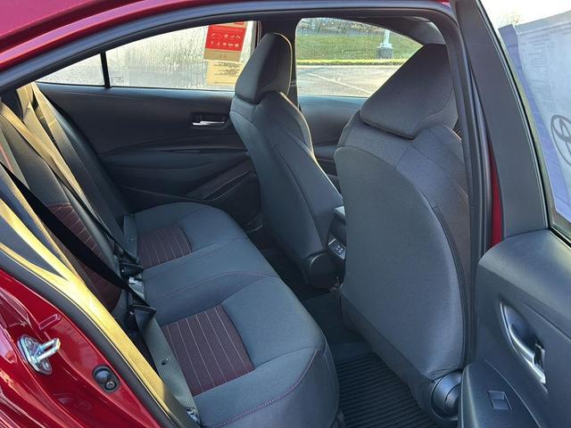 Photo of 2026 Ruby Flare Pearl w/Midnight Black Metallic Roof Toyota Corolla