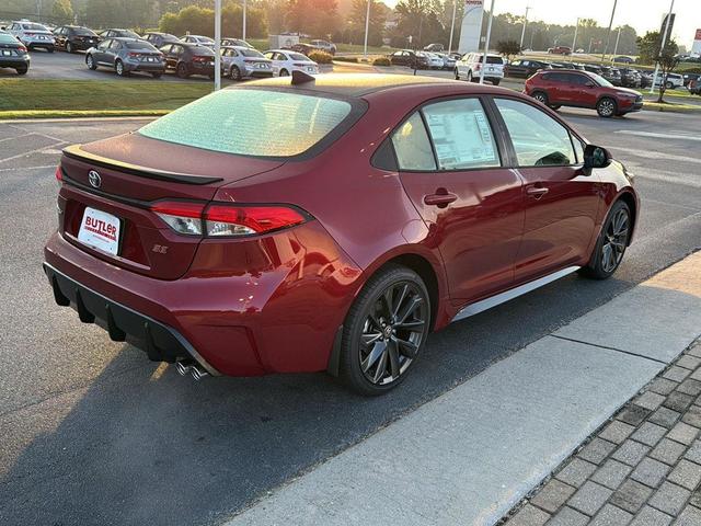 Photo of 2026 Ruby Flare Pearl w/Midnight Black Metallic Roof Toyota Corolla