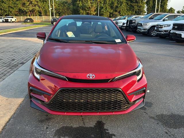 Photo of 2026 Ruby Flare Pearl w/Midnight Black Metallic Roof Toyota Corolla