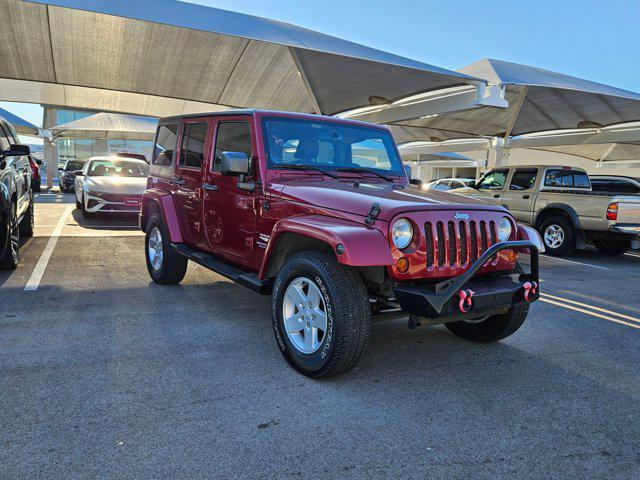 Photo of 2013 Deep Cherry Red Crystal Pearlcoat Jeep Wrangler Unlimited