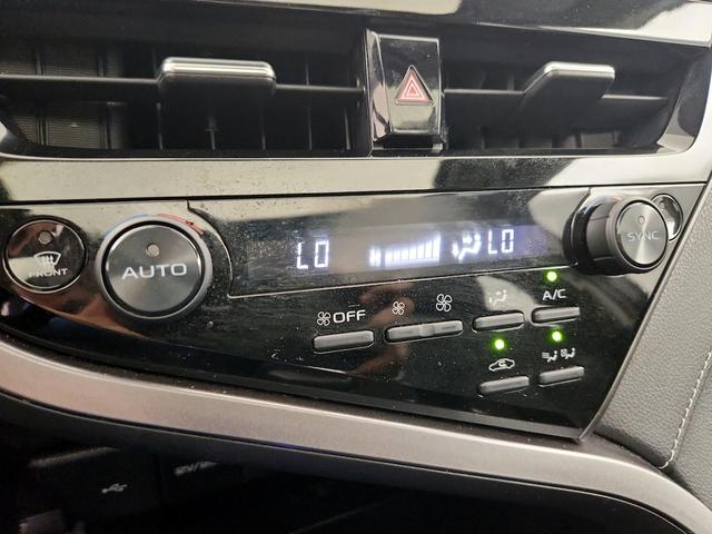 Photo of 2023 Black Toyota Camry Hybrid