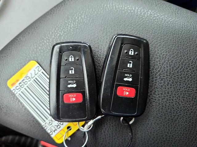 Photo of 2023 Black Toyota Camry Hybrid