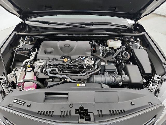 Photo of 2023 Black Toyota Camry Hybrid