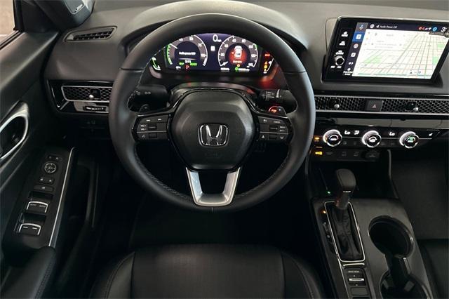 Photo of 2026 Blue Lagoon Honda Civic Hybrid