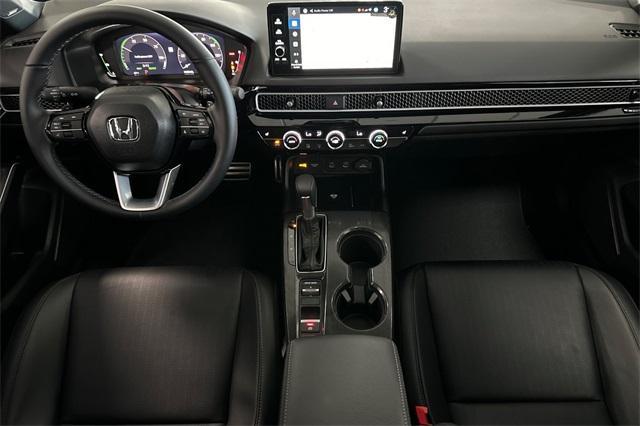 Photo of 2026 Blue Lagoon Honda Civic Hybrid
