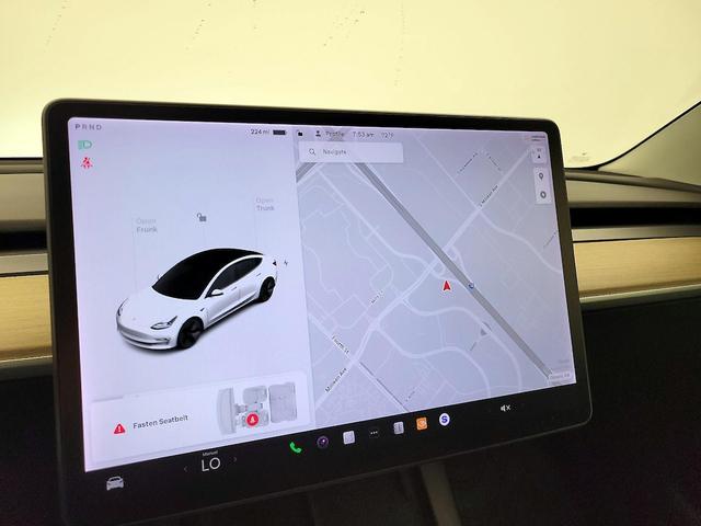 Photo of 2021 White Tesla Model 3