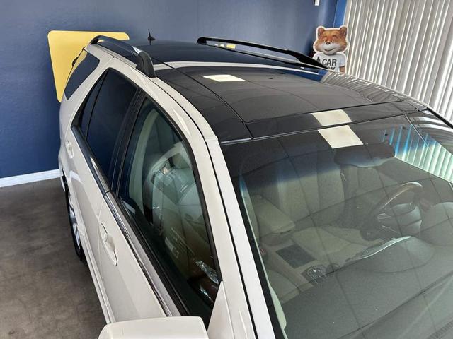 Photo of 2008 White Diamond Tintcoat Cadillac SRX