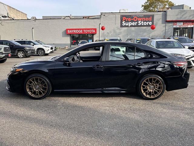 Photo of 2023 Midnight Black Metallic Toyota Camry