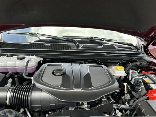 Photo of 2025 Delmonico Red Pearlcoat RAM 1500