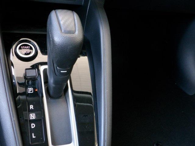 Photo of 2025 Scarlet Ember Tintcoat Nissan Versa