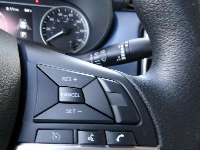 Photo of 2025 Scarlet Ember Tintcoat Nissan Versa