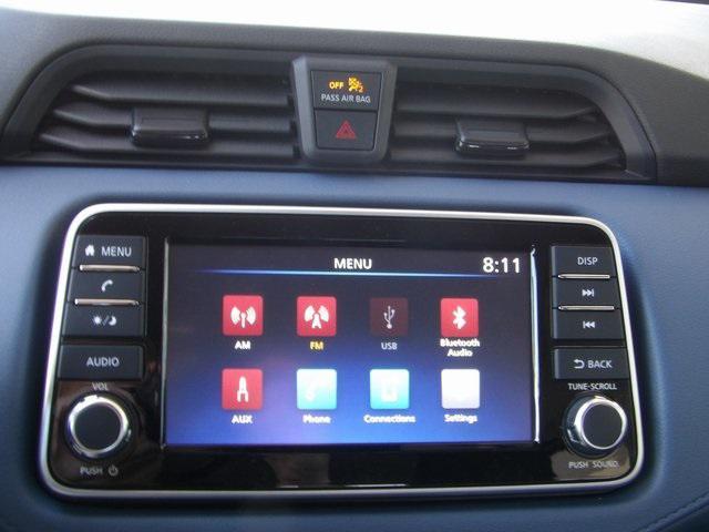 Photo of 2025 Scarlet Ember Tintcoat Nissan Versa