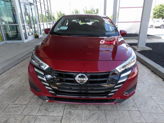 Photo of 2025 Scarlet Ember Tintcoat Nissan Versa