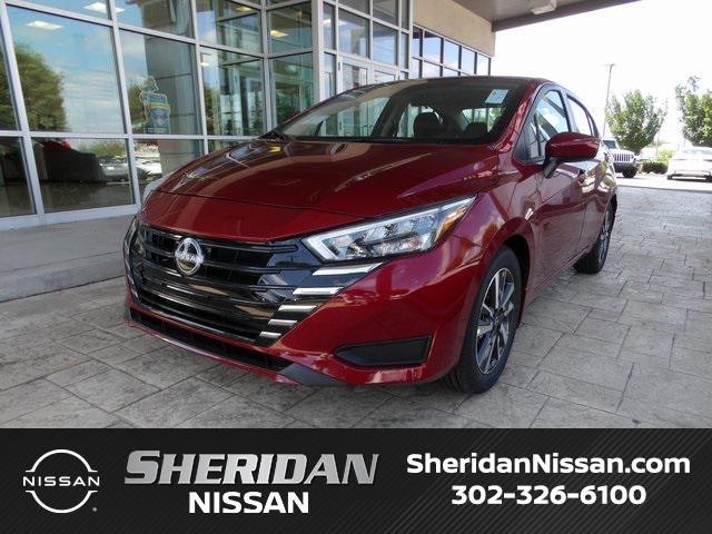 Photo of 2025 Scarlet Ember Tintcoat Nissan Versa