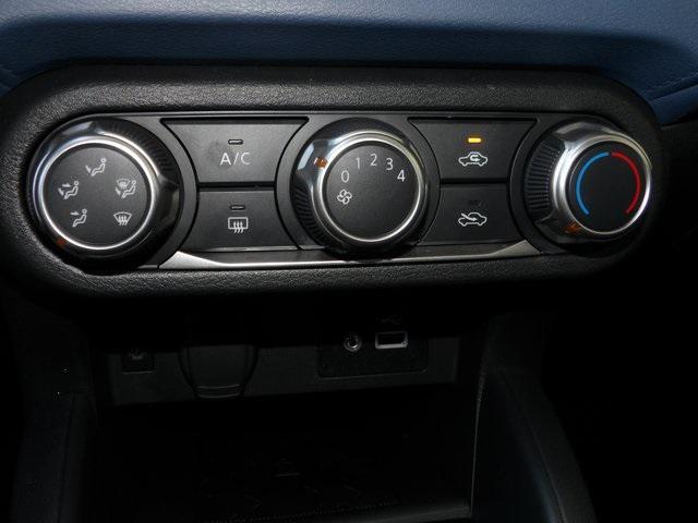 Photo of 2025 Scarlet Ember Tintcoat Nissan Versa