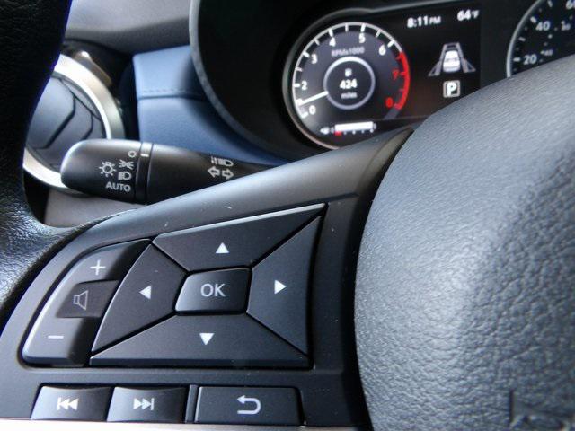 Photo of 2025 Scarlet Ember Tintcoat Nissan Versa