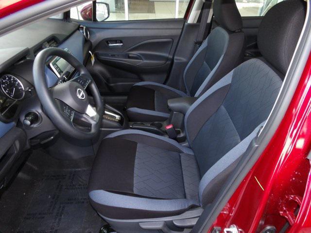 Photo of 2025 Scarlet Ember Tintcoat Nissan Versa