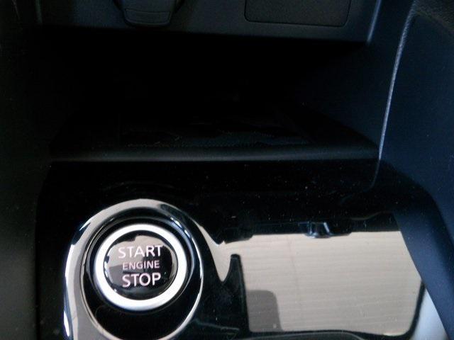 Photo of 2025 Scarlet Ember Tintcoat Nissan Versa